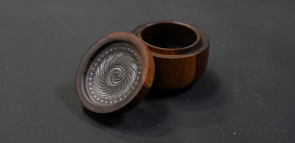 Small woodturned vessel with lid created at The Crucible. 